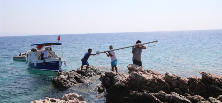 Bodrum'da ada ve koylara Türk bayrağı dikiliyor