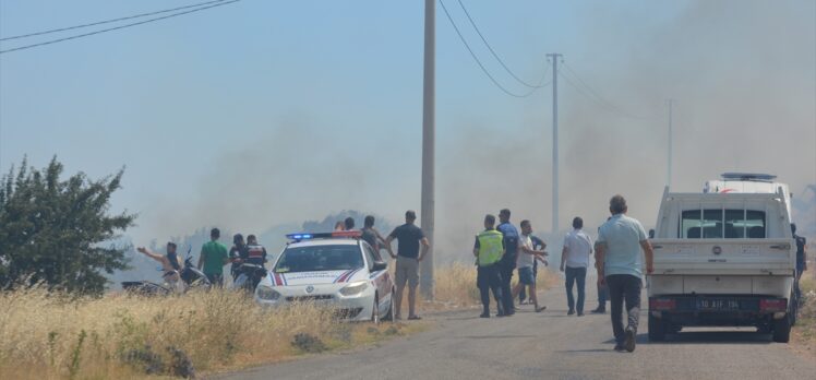 Ayvalık'ta çöplük alanda çıkan yangın makiliğe sıçradı